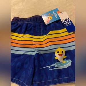 Size 24 months Baby shark swim trunk. Comfort mesh liner. UPF 50+ material